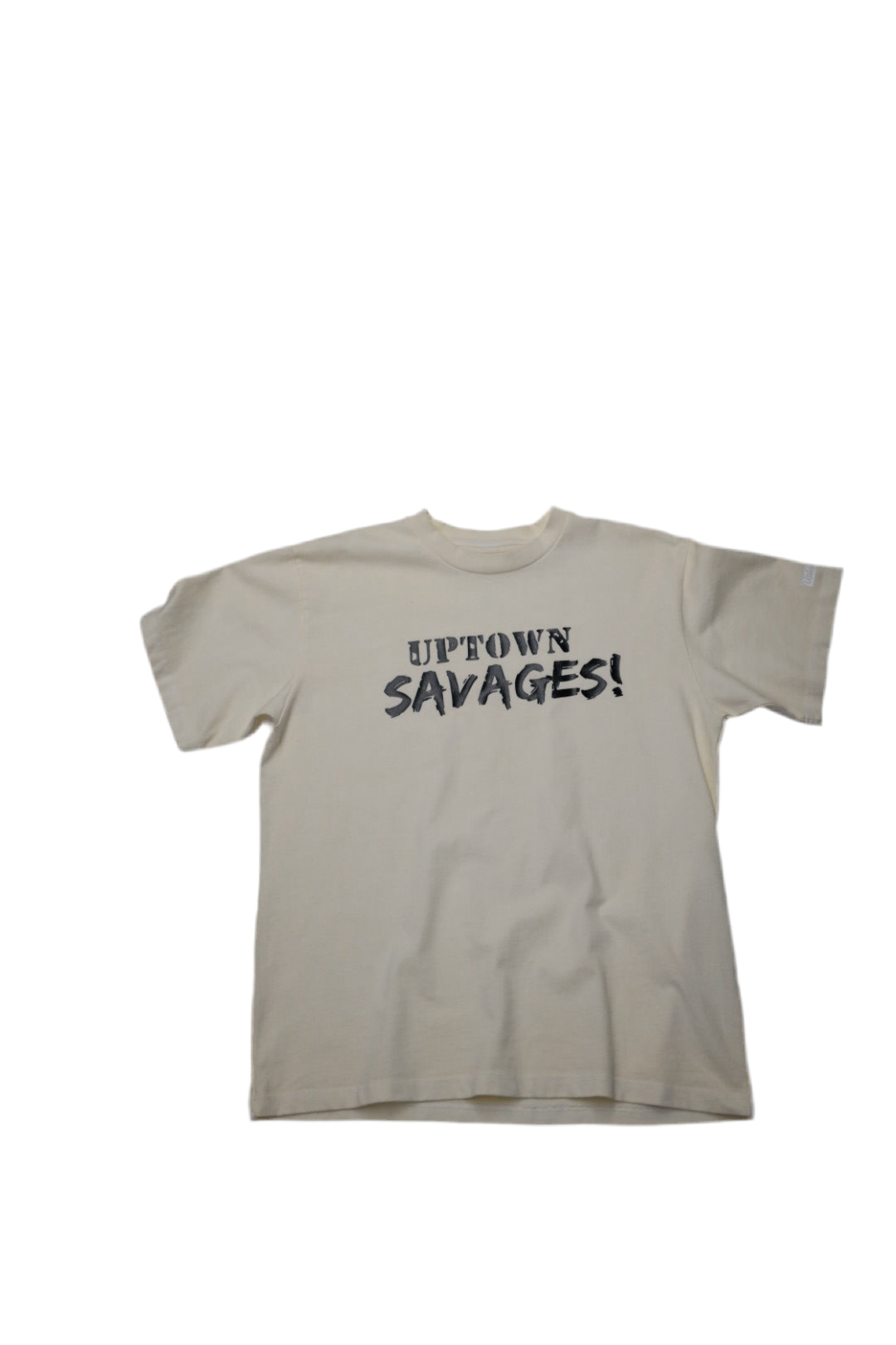 UPTOWN SAVAGES letters on cream suit