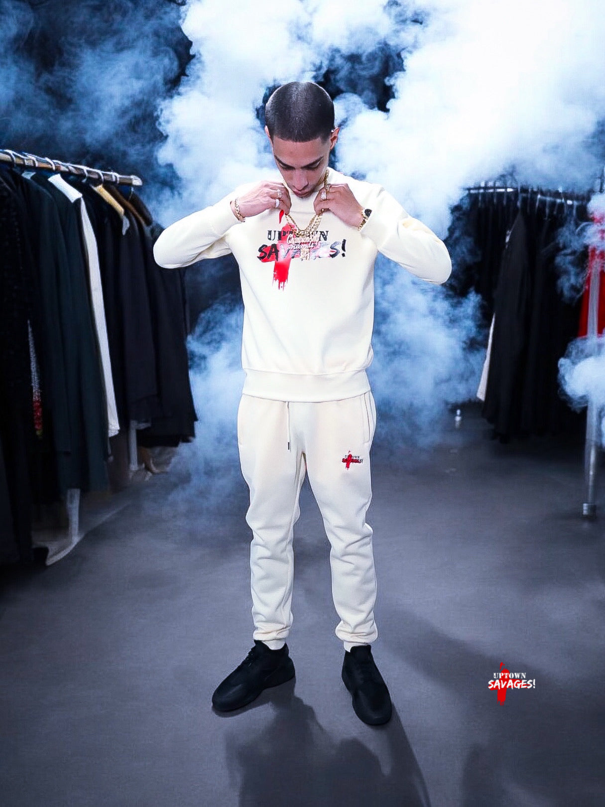 Uptown Savages logo cream suit