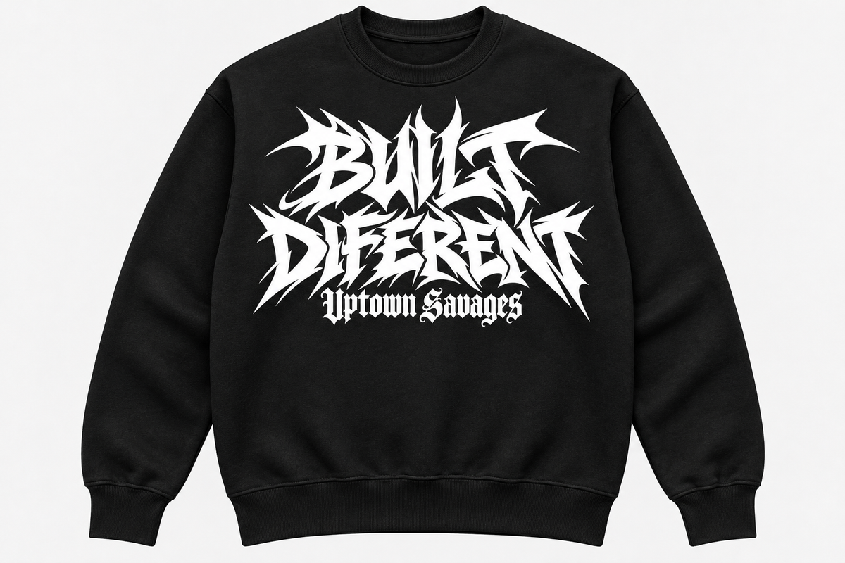 UPTOWN SAVAGES Built Diferent black crewneck sweatshirt with white graffiti lettering on the front
