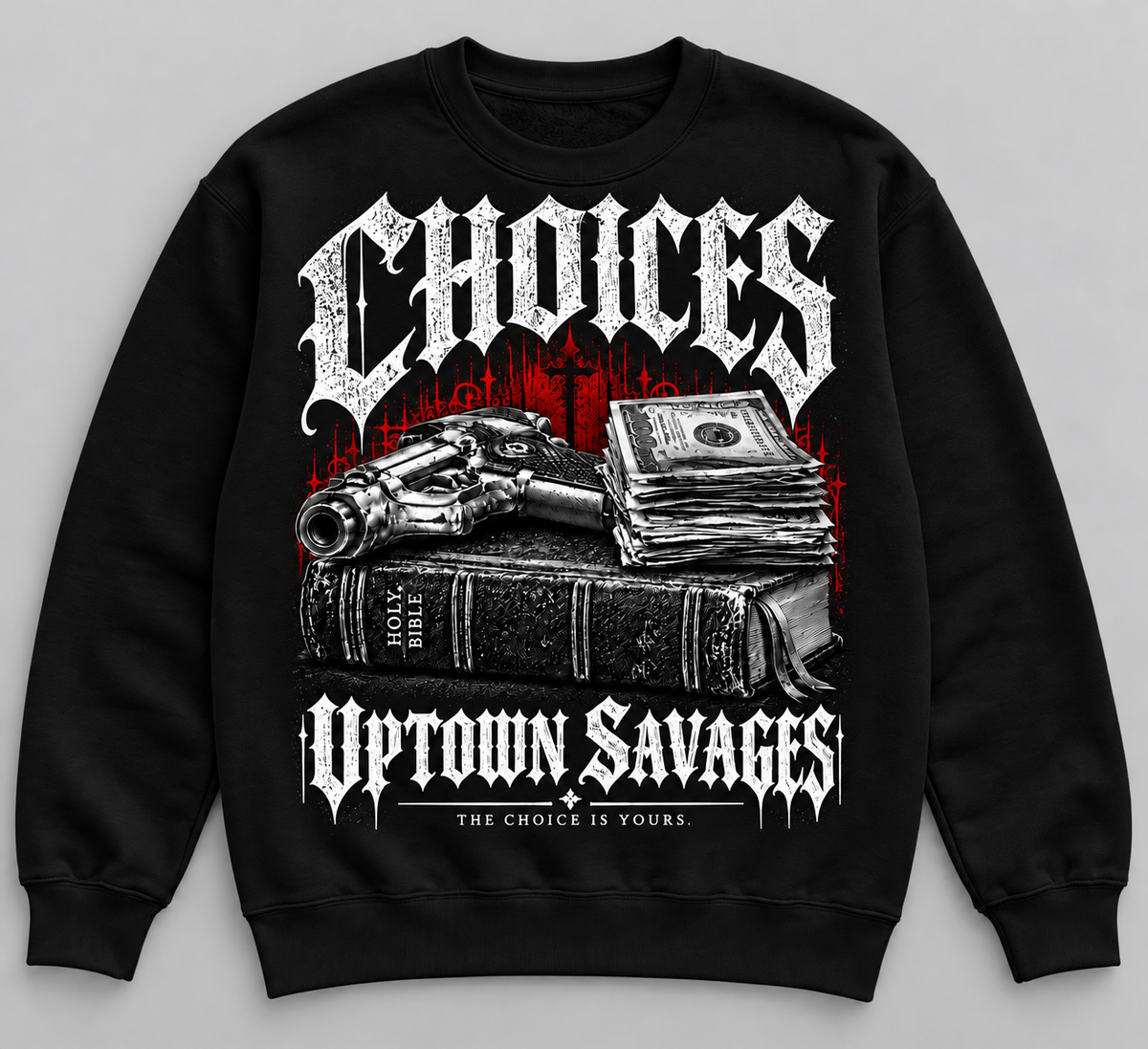 UPTOWN SAVAGES Choices black crewneck sweatshirt with Gothic lettering and red-accented Bible, cash and handgun graphic